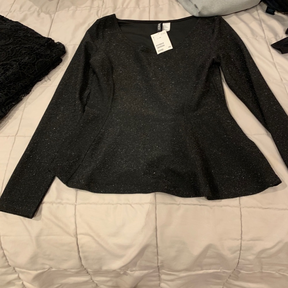 Brand new peplum top with tags